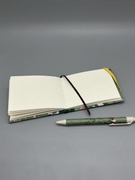 Buch Lesebändchen Gummiband handgebunden Notizen Stift